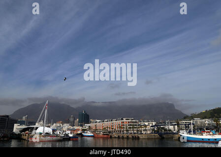 A view of the V&A Waterfront with Table Mountain and the Devil's Peak in the background in Cape Town, Western Cape, South Africa. Stock Photo