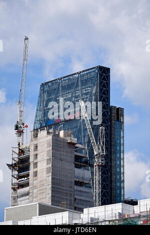 The Scalpel, 52 Lime Street, construction site by Skanska in front of The Cheesegrater, 122 Leadenhall Street, London, UK. Tower cranes Stock Photo