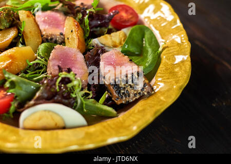 Salad with tuna and vegetables on a nice plate jpg Stock Photo