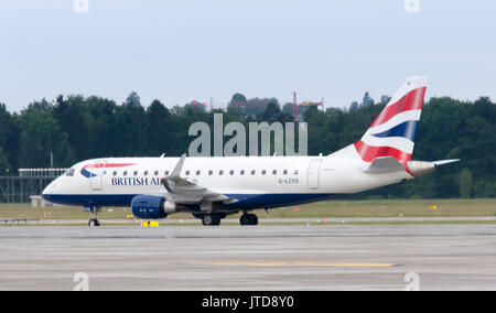 British Airways plane (Embraer ERJ-170STD) in Zurich leaving for London City Airport (Reg G-LCYD) Stock Photo