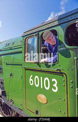 Driver Richard Jones carefully reverses ex-LNER locomotive No.60103 'Flying Scotsman' into Bishops Lydeard station, West Somerset Railway, England, UK Stock Photo