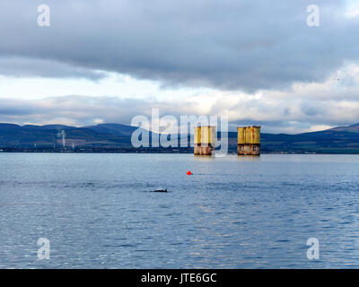 Scotland, Highlands, Partially Dismantled Drilling Rig, Sea Buoy, Dolphin, Yellow Drilling Rig Legs, Metal Structure, Mountaintop, Offshore Platform