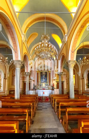 Beautiful church interior in Ermoupolis in Syros island, Greece.  There are many catholic and orthodox churches in Ermoupolis with beautiful interiors. Stock Photo