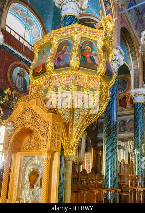 Beautiful church interior in Ermoupolis in Syros island, Greece.  There are many catholic and orthodox churches in Ermoupolis with beautiful interiors. Stock Photo