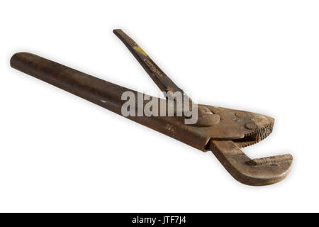 Rusty Pipe wrench on bright background Stock Photo