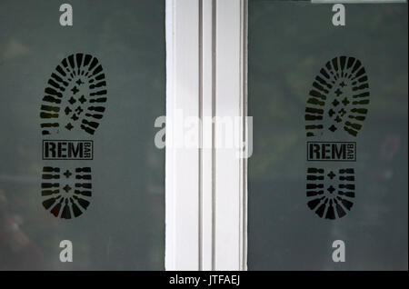 Window of the REM bar on Canal Street in Manchesters Gay Village Stock Photo