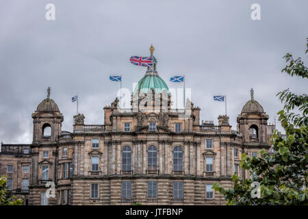 Edinburgh Bank with Union Flag and Scottish Flags Stock Photo