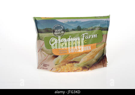 Unopened bag of Frozen Organic Sweet Corn by Cascadian Farms on white background. USA Stock Photo