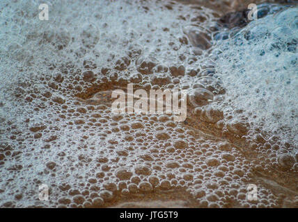bubbles and foam on waters surface Stock Photo