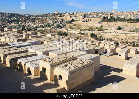 Dormition Abby and al-Aqsa Mosque in a panoramic view of Jerusalem from a cemetery on the Mount of Olives beside the Kidron Valley. Stock Photo