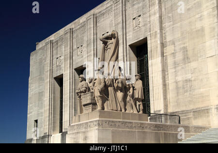 Elaborate sculptures at the base of the state capitol building represent important themes in Louisiana history Stock Photo