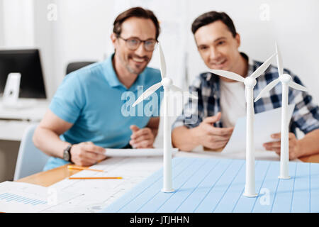 Two colleagues admiring the result of their work Stock Photo