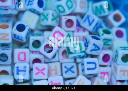 Mini coloured letter craft cubes. Stock Photo