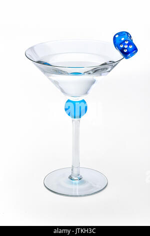 https://l450v.alamy.com/450v/jtkh3c/martini-in-a-fancy-glass-with-blue-game-dice-jtkh3c.jpg