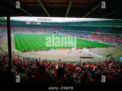 Rare stock photos of the interior of the old Wembley Stadium (Twin Towers) View of the pitch from the stands during a football match Stock Photo