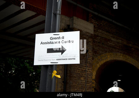 Grenfell Tower, West London. Aftermath of the tragedy. Notices pointing the way to the Assistance Centre. Stock Photo