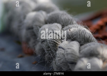 Rops on a boat in a marina Stock Photo