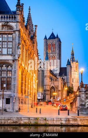 Gent, Belgium with Graslei district Saint Nicholas Church and Belfort tower at twilight illuminated moment in Flanders. Stock Photo