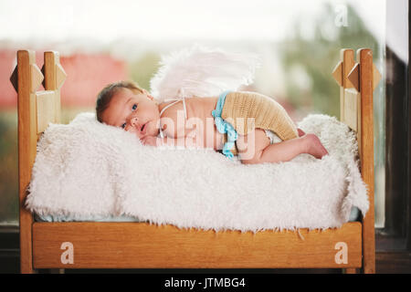 cute little cupid with wings Stock Photo