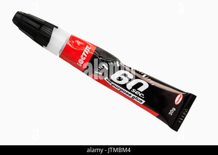 A tube of Loctite 60 second all purpose Glue adhesive on a white background Stock Photo