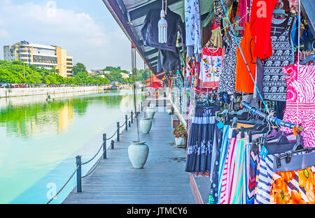 The wide range of stalls, offering clothes, shoes, souvenirs and other goods in Pettah Floating Market, Colombo, Sri Lanka. Stock Photo