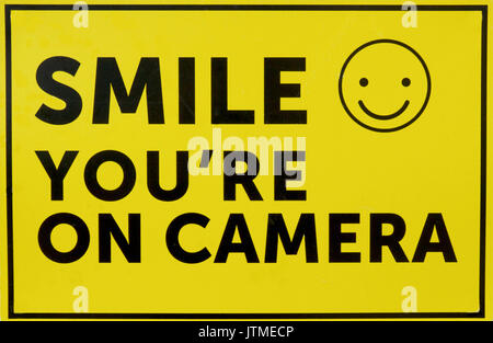 Smile You're on Camera sign. Stock Photo