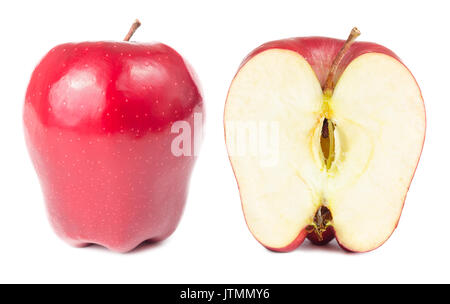 Fresh ripe red apple cut in half isolated on white background. Stock Photo