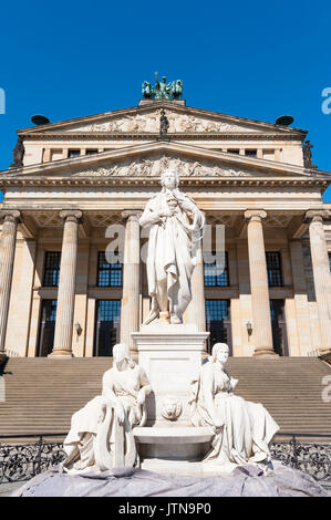 View of Konzerthaus and Schiller statue  in Gendarmenmarkt square in Berlin Germany Stock Photo