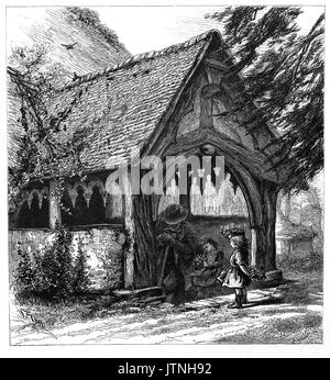 1870:  An old man and two young girls in the lovely old porch of the Norman Saint Giles church in Stoke Poges, a village in the South Bucks district of Buckinghamshire, England. Thomas Gray's  'Elegy Written in a Country Churchyard' is believed to have been written in the churchyard. Stock Photo