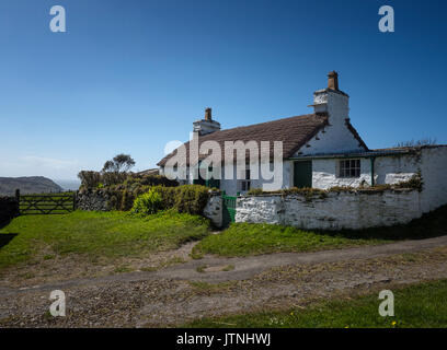Traditional Manx cottage in Cregneash, a small village in the south west of the Isle of Man Stock Photo