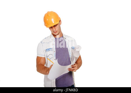 Construction engineer looking at the blueprint. Isolated on white. Stock Photo