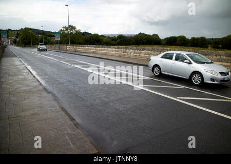 cars crossing land border between northern ireland and the republic of ireland in belcoo - blacklion Stock Photo