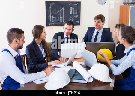 spanish team of architects working and brainstorming in office Stock Photo
