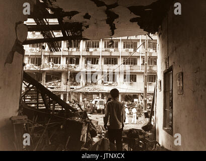Four Vietnamese and three Americans were killed, and dozens of Vietnamese buildings were heavily damaged during a Viet Cong bomb attack against a multi-story U.S. officers billet in Saigon.  April 1, 1966.  JUSPAO.  (USIA) NARA FILE #:  306-MVP-5-3 WAR & CONFLICT BOOK #:  420 Stock Photo