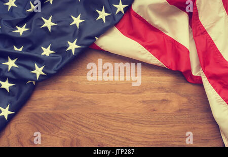 American flag border on American walnut wood with space for text, Memorial day concept background Stock Photo