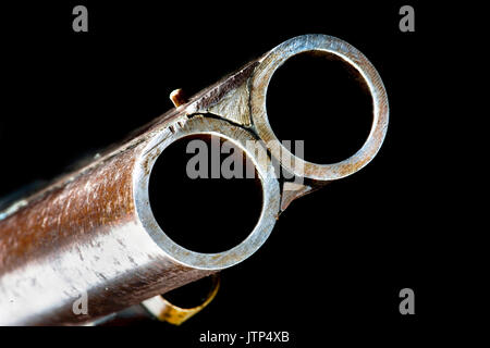 Antique double barrel shotgun closeup. Stock Photo