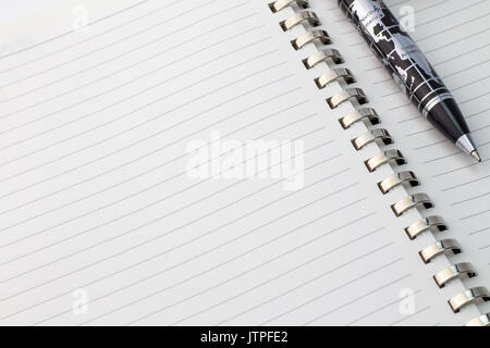 World map pen with North America and South America on blank note pad with space for text - close up view Stock Photo
