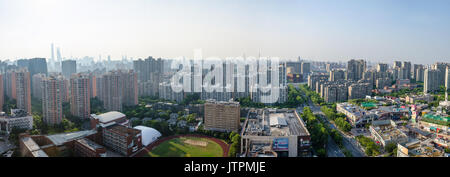 A view looking down at the Shanghai skyline form the top of an apartment building. Stock Photo