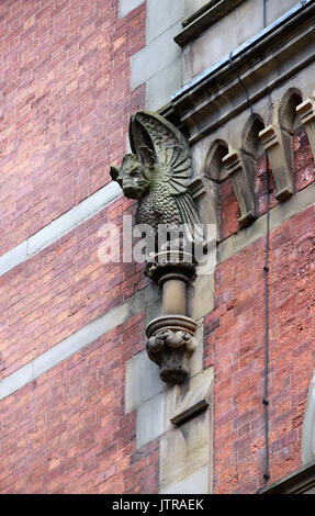 Carved stone grotesque on Minshull Street Crown Court building in Manchester Stock Photo