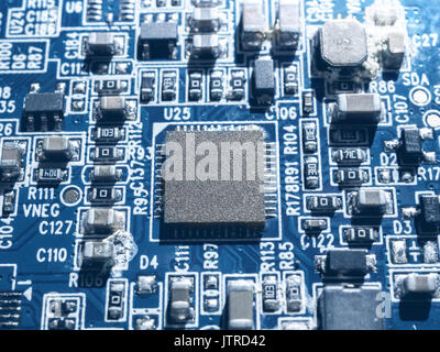 Electronic circuit chip board mother board computer CPU close up. Stock Photo