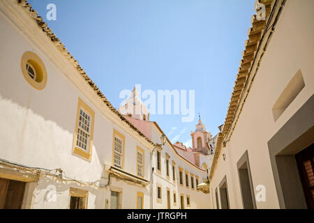 Street with historical buildings in the old town of Lagos, Algarve Portugal Stock Photo
