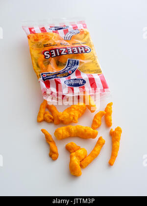 A bag of Cheezies, a brand of cheese puffs snack food made and sold in Canada by W.T. Hawkins Ltd. Stock Photo