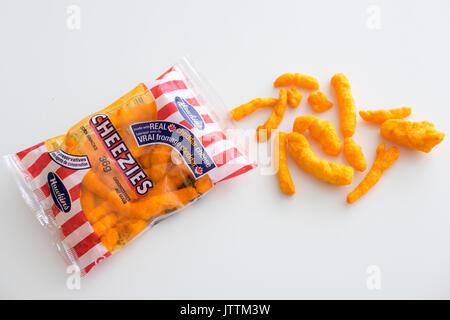 A bag of Cheezies, a brand of cheese puffs snack food made and sold in ...