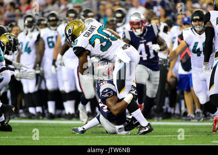 Jacksonville Jaguars running back Corey Grant, left, runs pass New Orleans  Saints linebacker Colton Jumper (58) during the first half of an NFL  preseason football game, Thursday, Aug. 9, 2018, in Jacksonville