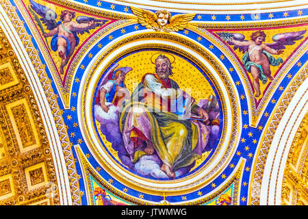 Saint Matthew Gospel Writer Evangelist Mosaic Angels Saint Peter's Basilica Vatican Rome Italy.  Mosaic right below Michaelangelo's Dome, Created in 1 Stock Photo