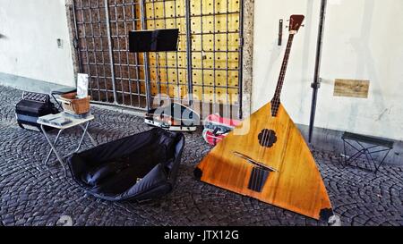 Musical instruments of street performer in downtown Munich, Germany Stock Photo