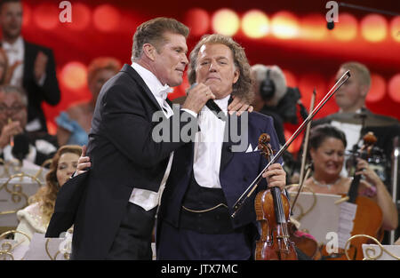 David Hasselhoff joins Andre Rieu on stage live from Vrifthof Square, in Maastricht, as part of his 30th Anniversary with the Johann Strauss Orchestra  Featuring: Andre Rieu, David Hasselhoff Where: Maastricht, Netherlands When: 09 Jul 2017 Credit: WENN.com  **Only available for publication in UK, USA, Germany, Austria, Switzerland** Stock Photo