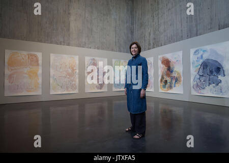 Artist Barbara Nicholls with her new watercolour piece 'sedmientary flow' on display on the 4th floor at the New Walsall Art Gallery, Walsall, West Midlands. Stock Photo