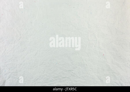 natural crumpled and creased light grey paper surface texture background with showing multicolored paper fibers Stock Photo