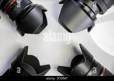 camera lenses laying on white  background Stock Photo